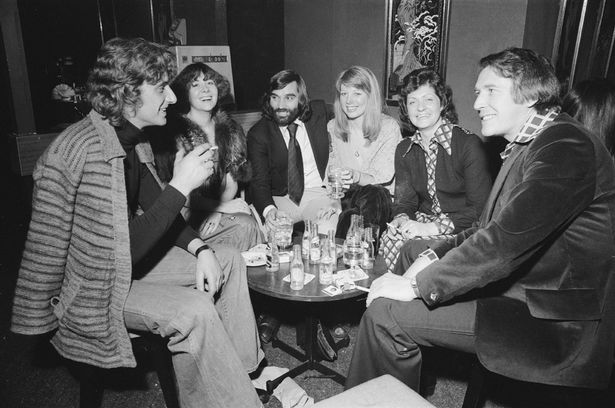 Footballer  George  Best  with  friends  at  his  night  club  Slack  Alice  in  Manchester.  4th  February  1976